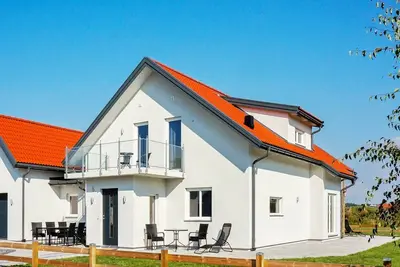 Image de Maison de vacances pour 8 a Glommen-By Traum