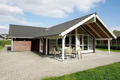 Image de Maison de vacances pour 8 a Juelsminde-By Traum