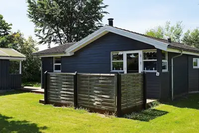 Image de Maison de vacances pour 8 a Hesselager-By Traum