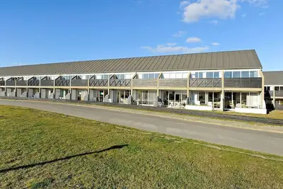 Image de Maison de vacances pour 4 a Fanø-By Traum