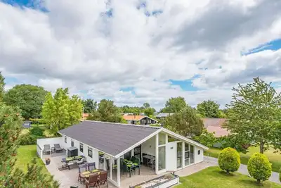 Image de Maison de vacances pour 8 a Juelsminde-By Traum