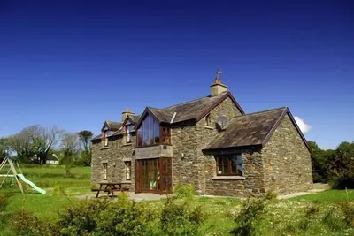 Image de Magnifique, cottage en pierre moderne très privé avec magnifiques vues sur mer