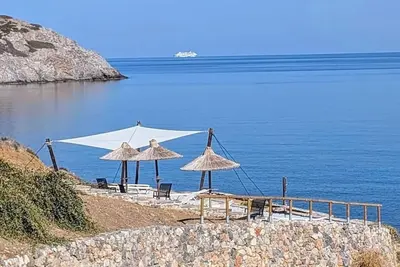 Image de Location privée front de mer Musuri avec son propre accès privé à la mer
