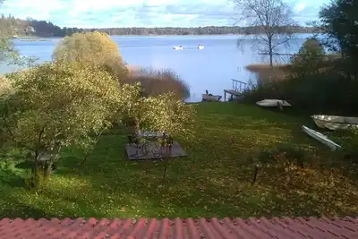 Image de Maison familiale avec front de mer rénovée, bateau, Wifi et électricité inclus. pêche