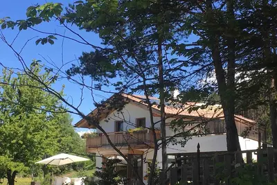 Image de Chalet Ly's Nest - Maison en montagne  avec étang naturel et terrain clôturé de 4500 m².