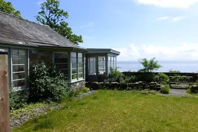 Image de Un chalet de bord de mer idyllique sur la plage avec une vue imprenable. La position la plus parfaite pour un