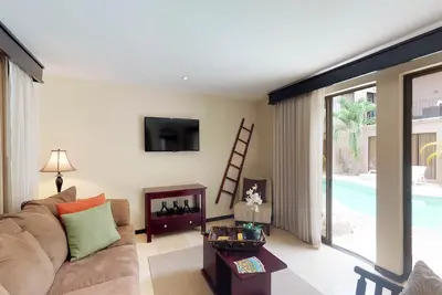 Image de Appartement en bord de plage avec piscines et tennis communs, accès au club de plage