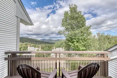 Image de Condo skis aux pieds avec vue sur la montagne, piscine commune, bain à remous et tennis