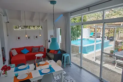 Image de Maison de vacances à Guajar Fondón avec priv. Piscine + jardin, vue sur la montagne, AirCo, WiFi, Sat-T