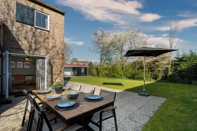 Image de Schouwse duin 27 Maison de vacances avec un grand jardin et beaucoup de convivialité