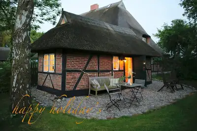 Image de Kl. Reetkate f. 2 pers. / Wlan / sauna / jardin / à quelques minutes de la plage