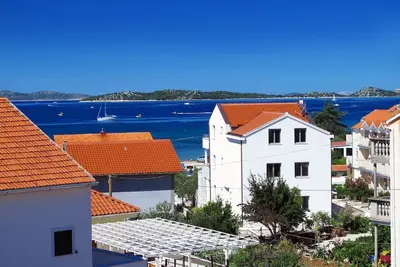 Image de Bel appartement à Vodice / Srima avec vue mer - à 80 m de la plage climatisation, wifi