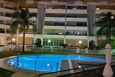 Image de Appartement confortable, avec terrasse, jardins et piscine.