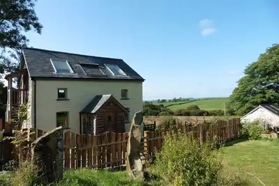 Image de Bwthyn Bran, chalet confortable à 1 lit situé au bord des collines de Preseli. Animaux acceptés