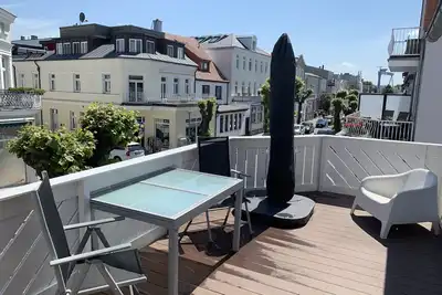 Image de « Seelenstreichler » - 58 mètres carrés avec grand balcon ensoleillé et cheminée en bois - Central