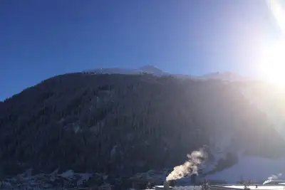 Image de Confortable appartement dans le centre de Davos, à distance de marche de l'ascenseur de ski, une vue panoramique