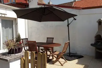 Image de Appartement 4* rez de jardin, terrasse privée, wifi gratuit, adaptation Pmr