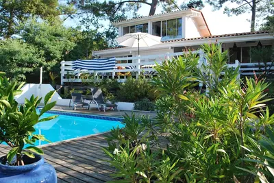 Image de Pyla sur Mer Villa luxe 300 m plage. Vue mer Piscine chauffée Vélos Bateau Boule