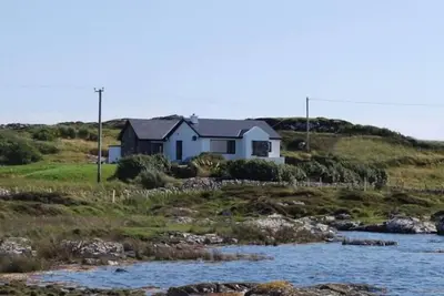 Image de Ocean Front Accueil avec une vue spectaculaire sur Mannin Bay