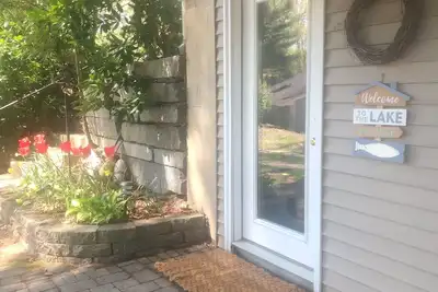 Image de Belle Maison Lakefront avec plage privée