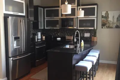 Image de Attique du centre-ville avec terrasse, 1/2 étage de la rue principale au coeur du centre-ville