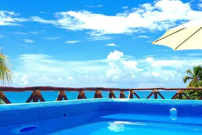 Image de Incroyable Mansion 6 chambres sur l'une des plages immaculées World Best.