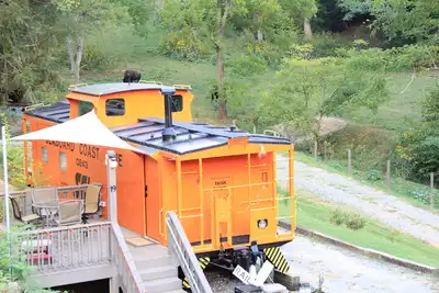 Image de Dormez dans un fourgon de queue dans un ranch de bison: Seaboard Coast Line # 0843