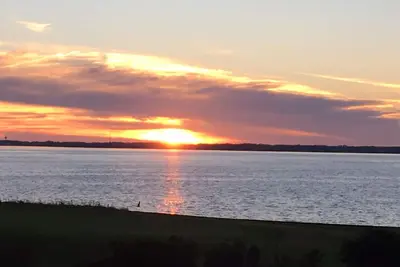 Image de Une chance pour une détente totale, couchers de soleil, plage, piscine, golf et accès!
