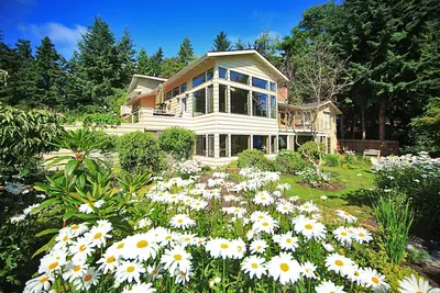 Image de Maison de luxe au bord de l'eau - piano, billard, foyer, cuisine gastronomique et plus encore!