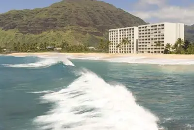 Image de Condo au rez-de-chaussée à pied de la plage, véranda privée.