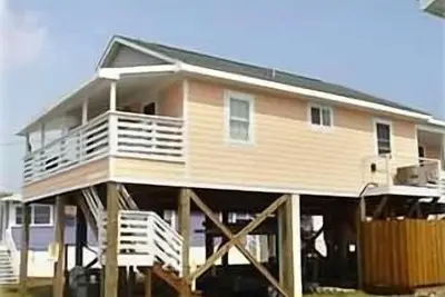 Image de Une rue plus - Cottage par la mer!