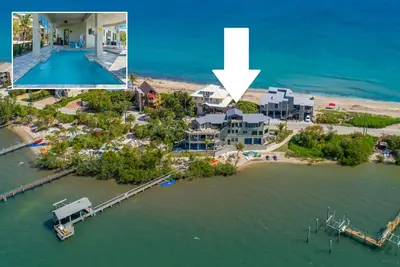 Image de Nirvana Shores: Ocean-2-River Fl Beach House avec piscine chauffée, quai, ascenseur, bain à remous
