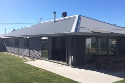 Image de Maison de vacances moderne de 4 chambres. Wifi illimité