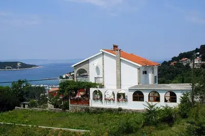 Appartement de trois chambres avec la terrasse et la vue sur le mer Kampor, Rab (A-14998-a)