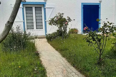 Image de Maison confortable à 800m de la plage avec jardin