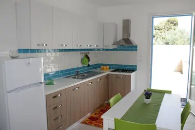 Image de L'ondazzurra villas neuves en bord de mer.
