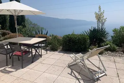 Image de Appartement terrasse exclusive avec une vue imprenable sur le lac de Garde