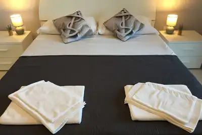 Image de Le Domus bel appartement avec jardin.