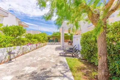 Image de Villa Orchidea. Jardin clos - Pour les familles - Ac- Wifi - Proche de la plage