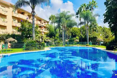 Image de Plage appartement de deux chambres villa avec piscine à Marbella