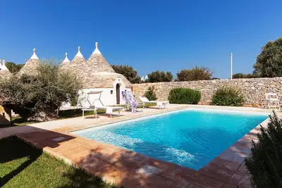 Image de Trulli with private pool and air-conditioning close to amazing beaches