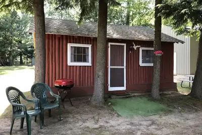 Image de Cabine confortable \"Beach\" dans les bois avec façade et accès au lac Pentwater