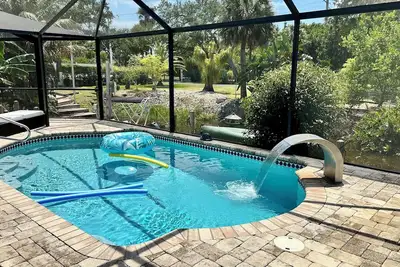 Image de Villa de vacances 6min. à la plage, piscine chauffée, canoë, WiFi gratuit