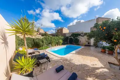 Image de Charmante maison de ville avec piscine - Casa Can Tatau