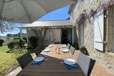 Ty Pacha Vue mer Wifi jardin et parking, dépaysement à Ile Grande