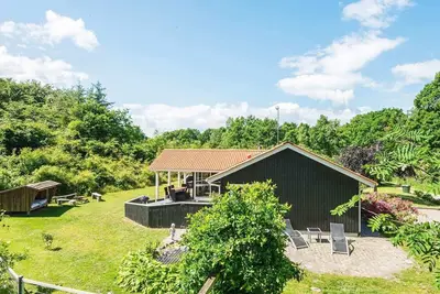 Image de Maison de vacances pour 8 a Glesborg-By Traum