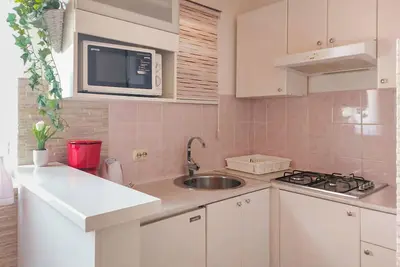 Image de Bel appartement avec climatisation, Wifi, Tv, terrasse, animaux admis et parking