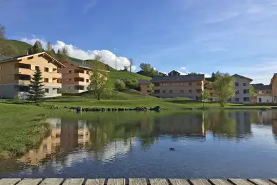Confortable appartement avec piscine, Wifi, bain à remous, Tv, patio, vue panoramique et parking
