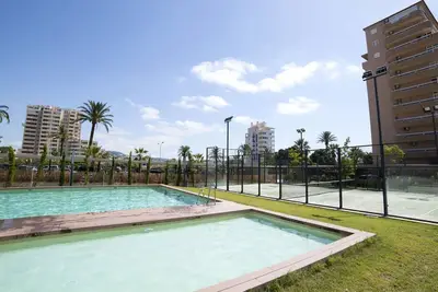Image de Joli appartement pour 4 personnes avec Wifi, climatisation, piscine, Tv, terrasse et parking