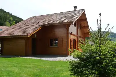 Image de Chalet Sauna, Jacuzzi, borne  de charge voiture électrique à 5 min des pistes,